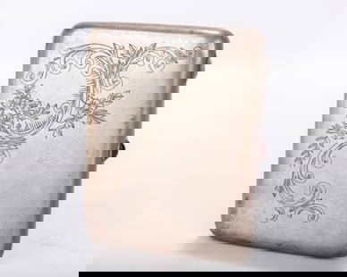 A RARE RUSSIAN SILVER CIGARETTE CASE. Moscow, Soviet era. Engraved with floral and organic designs.: A RARE RUSSIAN SILVER CIGARETTE CASE. Moscow, Soviet era. Engraved with floral and organic designs. Engraved with a dedication inscription dated to 1953. 4.2" x 3.2" and 185 grams.