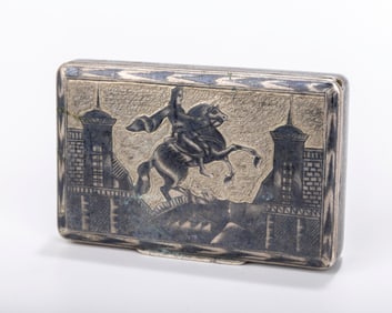 A SILVER AND NIELLO DECORATED TOBACCO BOX. Russia, 1846. Decorated on the lid with a galloping