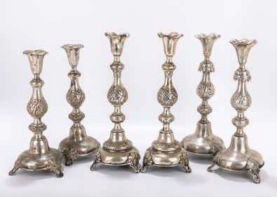 TREE PAIRS OF SILVER SABBATH CANDLESTICKS. Warsaw, c. 1890. All with grape vine support round domed