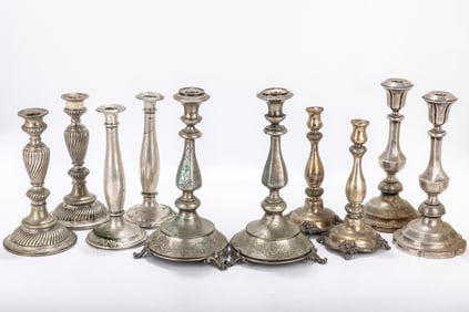 FIVE PAIRS OF SILVER SABBATH CANDLESTICKS. Vienna, c. 1900. Three sets are bright cut designs and