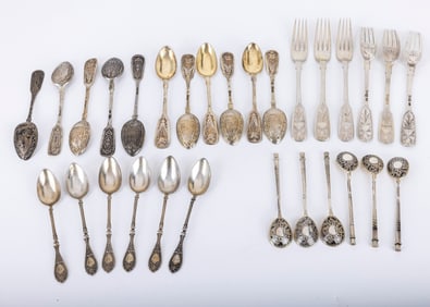 A GROUP OF RUSSIAN SILVER FLATWARE. Russia, c. 1880. Including 12 teaspoons, 6 teaspoons, 6