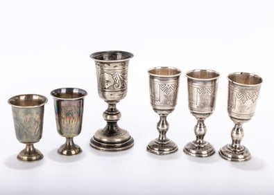 A GROUP OF SIX RUSSIAN SILVER KIDDUSH CUP. Various ages. Most are about 3â€? tall. Total