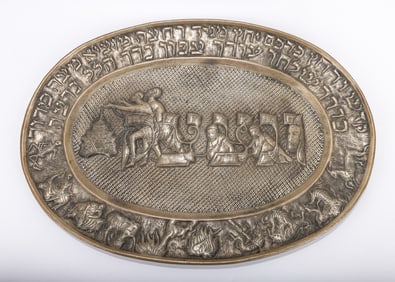 A LARGE SILVER OVAL SEDER TRAY. Probably Israel, modern. Hand chased with the order of the seder.