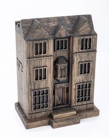 A WOODEN CHARITY BOX IN THE SHAPE OF 770 EASTERN PARKWAY