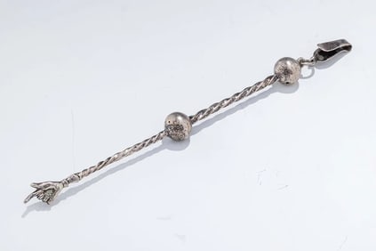 A SILVER TORAH POINTER. Poland, c. 1800.