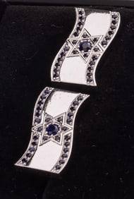 A PAIR OF 14K WHITE GOLD ISRAELI FLAG OF DAVID CUFFLINKS.