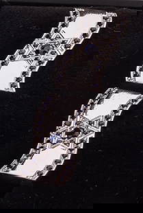 A PAIR OF 14K WHITE GOLD ISRAELI FLAG OF DAVID CUFFLINKS.: Israel, modern. Decorated with hand cut blue sapphires.