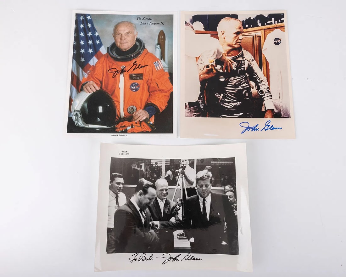 THREE AUTOGRAPHED PHOTOGRAPHS OF JOHN GLENN JR.. One in astronaut garb, one with JFK and one earlier (1 of 1)