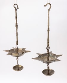 10. A PAIR OF BRASS JUDENSTERNS. Probably Italian, 19th century. Each with a six pointed oil