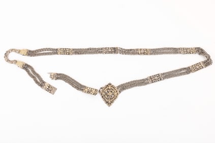 18. A SILVER 'WEDDING BELT'. Ottoman Empire, 20th century. Consisting of two solid chains