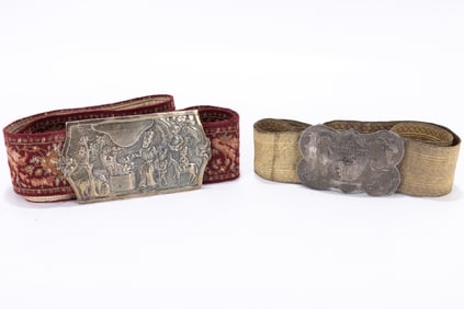 20. TWO SILVER YOM KIPPUR BELTS. Continental, 20th century. Each chased and engraved with related
