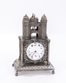 21. A SILVER CLOCK. Probably Israel, 20th century. Castle form. Fitted with a Hebrew letter watch