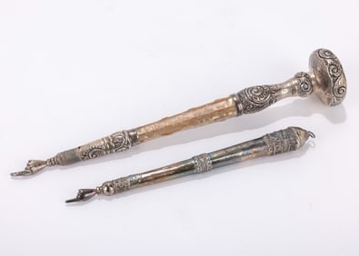 26. TWO TORAH POINTERS. One Israel sterling silver and one from a converted parasol handle. The