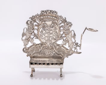 41. A SILVER HANUKKAH LAMP. In Frankfurt style. On four feet that support a rectangular body. The