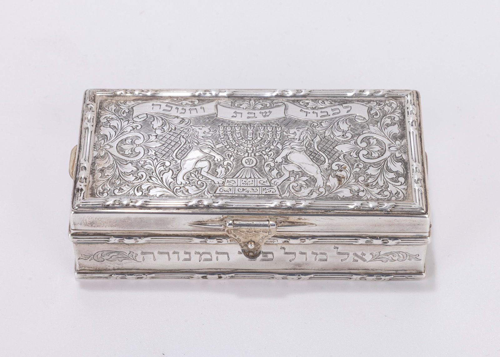 46. A STERLING SILVER HANUKKAH LAMP AND SABBATH LAMP BY GOLDSMITHS AND SILVERSMITHS COMPANY (42 (1 of 10)