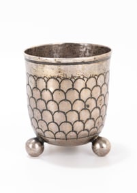 86. AN EARLY SILVER GERMAN BEAKER. Nuremberg, c. 1790. On three balled feet with U shaped embossing,