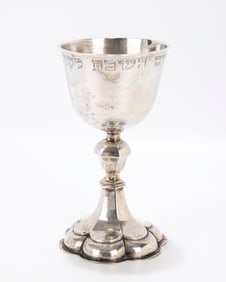 87. A LARGE SILVER GOTHIC FORM KIDDUSH CUP. Nuremberg, 19th century. On a stylized dome base with a