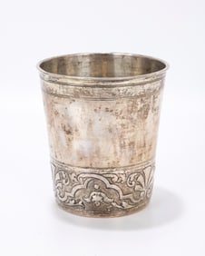 89. A LARGE SILVER KIDDUSH BEAKER. Nuremberg, 18th century. The base is embossed and tooled with