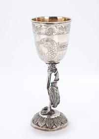 94. A LARGE SILVER KIDDUSH GOBLET. Poland, early 19th century. On a domed base with a stork shaped