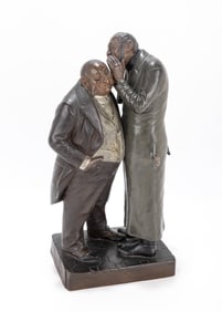 98. AN ANTI-SEMITIC PORCELAINE FIGURINE. Czechoslovakia, c. 1910. Depicting two Jewish bankers in