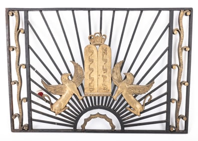 125. A WROUGHT IRON SYNAGOGUE DECORATION. Probably American, c. 1920. Depicting two winged griffons