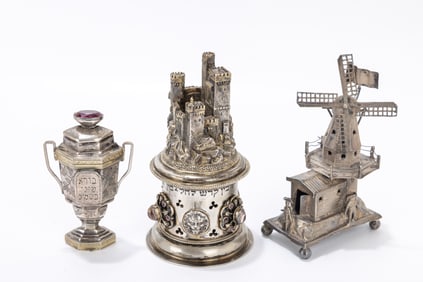 136. TWO SILVER SPICE CONTAINERS AND A HAVDALLAH CANDLE HOLDER. Continental. The havdalah candle
