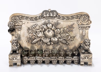 144. A LARGE SILVER HANUKKAH LAMP BY LAZARUS POSEN. Frankfurt-Au-Main, c. 1900. Decorated with two