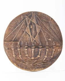 161. A LARGE CAST BRONZE EXODUS PLAQUE. By W. Schiffen. It shows a menorah over a ship 8.8".