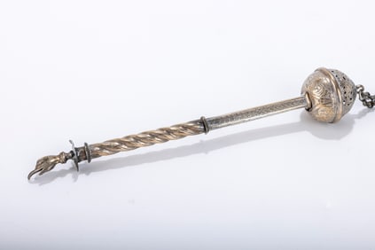 165. SILVER TORAH POINTER. Poland, c. 1800. Consisting of a large hand chased spherical grip that