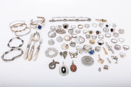 171. A GROUP OF APPROXIMATELY 60 PIECES OF STERLING SILVER JEWELRY. Including rings, bracelets,
