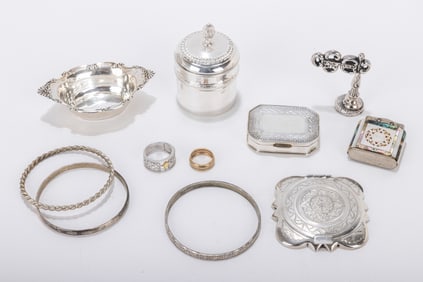 174. A GROUP OF STERLING SILVER OBJECTS. Including a master salt, a pill box, a compact, three