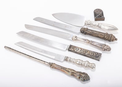 178. A GROUP OF SIX STERLING SILVER HANDLED KNIFES AND OTHERS. Including four challah knives, one