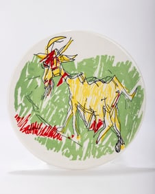 201. A CERAMIC PLATE BY MENASHE KADISHMAN. Israel c. 1990. Decorated with a ram. Signed. 12' wide.