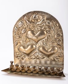 212. A BRASS HANUKKAH LAMP. The Netherlands, 20th century. The back plate is chased with floral and