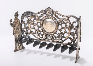 221. A LARGE BRASS HANUKKAH LAMP. Prague, c. 1850. One side supports Moshe and one is Aaron.
