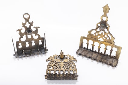 225. THREE SEPHARDIC STYLE HANUKKAH LAMPS. Israel, 20th century. Each in architectural form. One