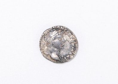 234. A ROMAN SILVER COIN (98-117 C.E.). Issued by Traianus. Obverse with the head of Traianus, and