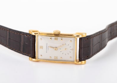PATEK PHILIPPE. 18K GOLD RECTANGULAR WRISTWATCH. With unusual lugs. 1948 model. Ref:2415. MVT 970666
