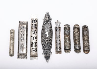 A GROUP OF EIGHT STERLING SILVER MEZUZAH COVERS. Israel, 20th century. Four in modernist design and