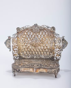A HAND MADE SILVER CHANUKAH LAMP BY MICHAEL ENDE. Jerusalem, c 1980. Chased with diamond back plate