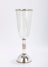 A STERLING SILVER KIDDUSH GOBLET BY MICHAEL ENDE. Jerusalem, c. 1980. On a domed base. The upper por