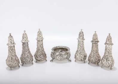 A SET OF SIX STERLING SILVER SALT AND PEPPER SHAKERS BY STIEFF. Each piece is 4.2 inches tall.