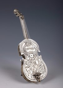 A STERLING SILVER SPICE BOX. Israel, Modern. By Netafim. In the shape of a guitar.