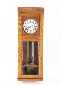 THREE ANTIQUE CLOCKS AND AN ANTIQUE RADIO