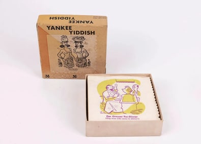 A BOX OF YANKEE YIDDISH NAPKINS. San Francisco, 1960. Each one has an imprinted cartoon with a Yiddi