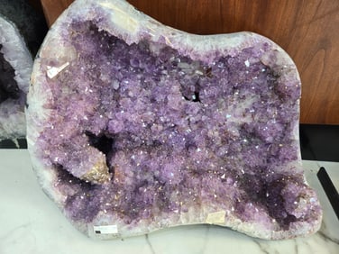 A LARGE AND WELL COLORED AMETHYST GEODE