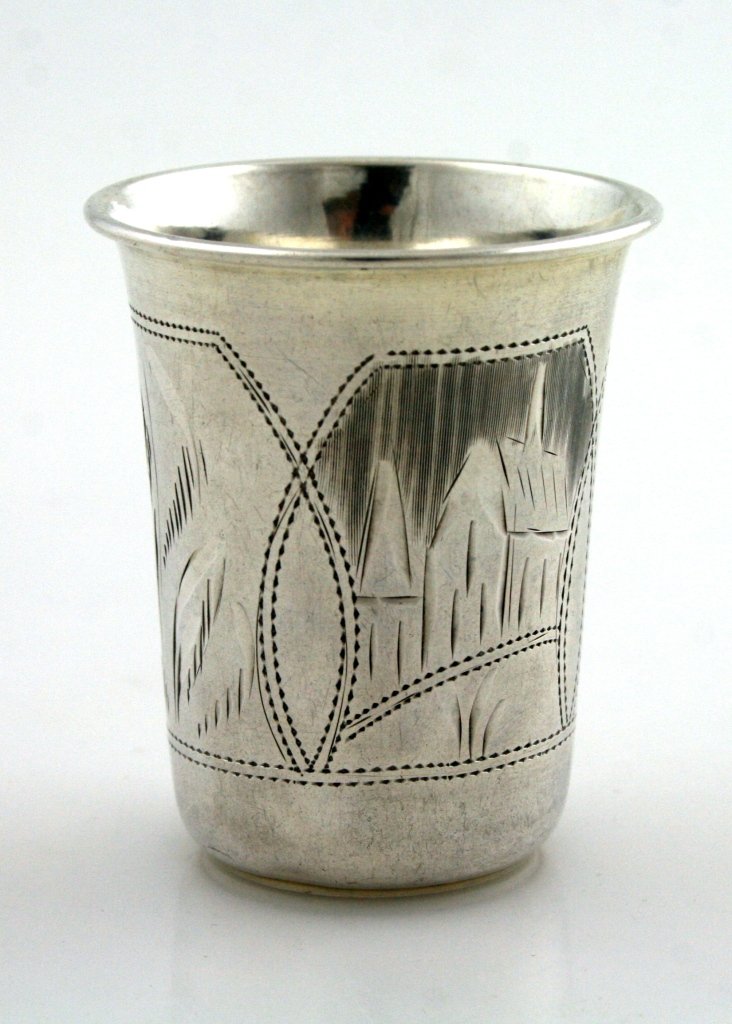 A SILVER BEAKER. Russia, c. 1890. Engraved with town an: A SILVER BEAKER. Russia, c. 1890. Engraved with town and floral designs. Marked. 2.4” tall. Estimate $90 – 120