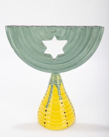 A CERAMIC MENORAH . American, 1999.