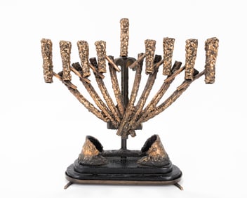 A BRUTALIST BRASS MENORAH BY H. HENDIN. Probably American, 20th century.
