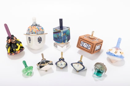 A GROUP OF 10 MULTICOLORED DREIDELS. Mostly Israel and the USA.